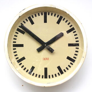 Aged East German vintage wall clock. Made in Leipzig by RFT (Rundfunk- und Fernmelde-Technik), 1952