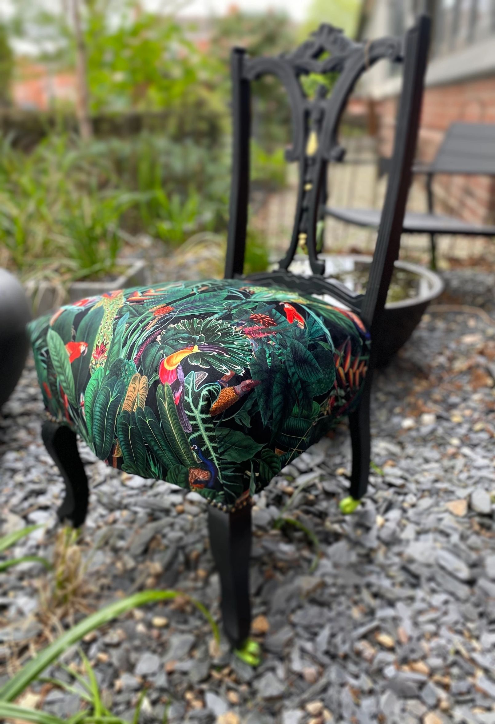 Victorian nursing chair reupholstered in Amazon jungle printed velvet and detailed with 18ct gold leaf