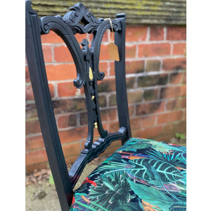 Victorian nursing chair reupholstered in Amazon jungle printed velvet and detailed with 18ct gold leaf
