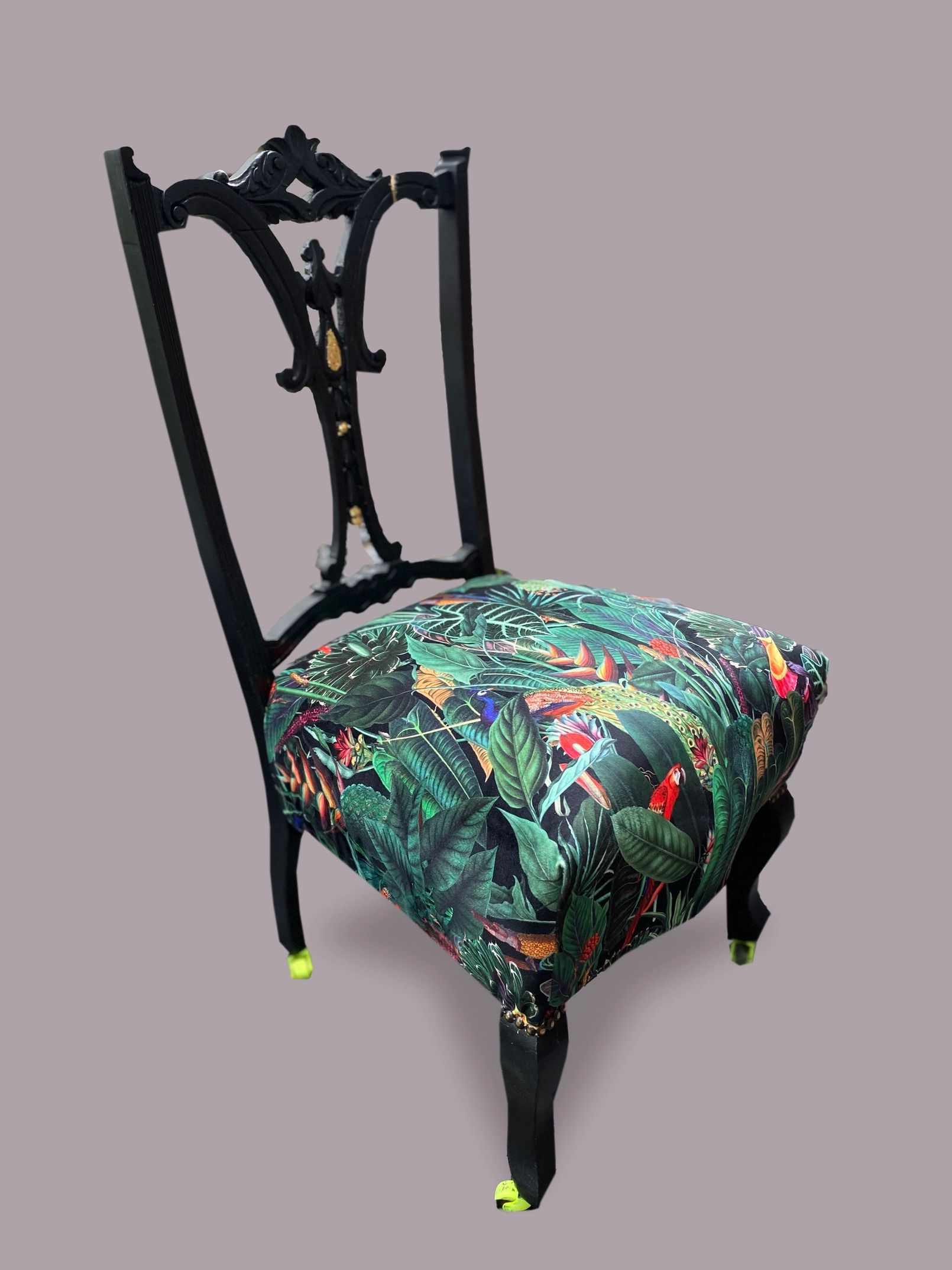 Victorian nursing chair reupholstered in Amazon jungle printed velvet and detailed with 18ct gold leaf