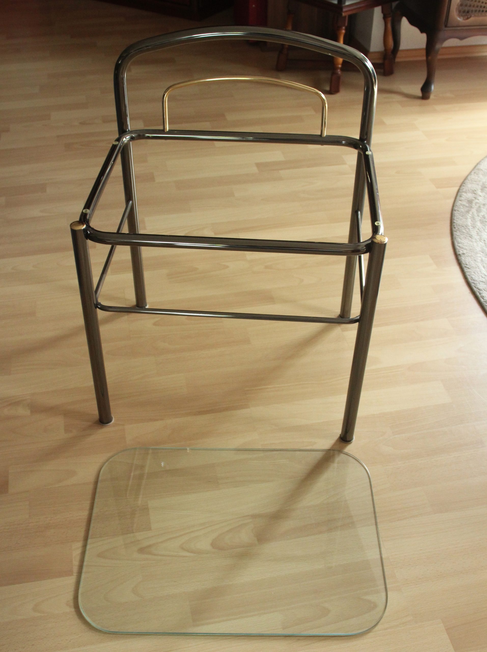 Space Age chrome plated metal and glass bedside table, vintage from the 70s