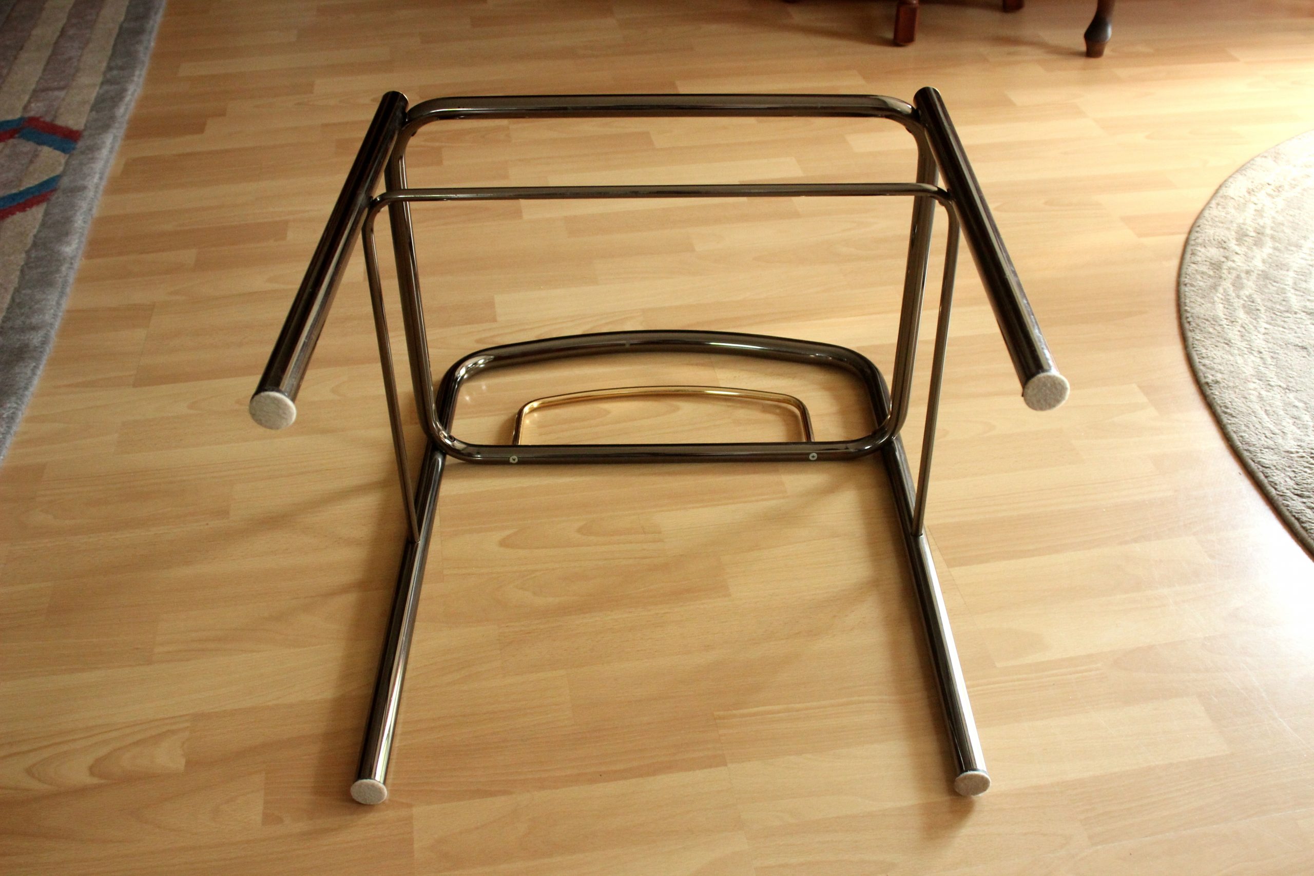 Space Age chrome plated metal and glass bedside table, vintage from the 70s