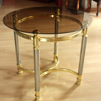 Hollywood Regency Style round coffee table, side table, made of metal with a smoked glass plate, vintage from the 1970s