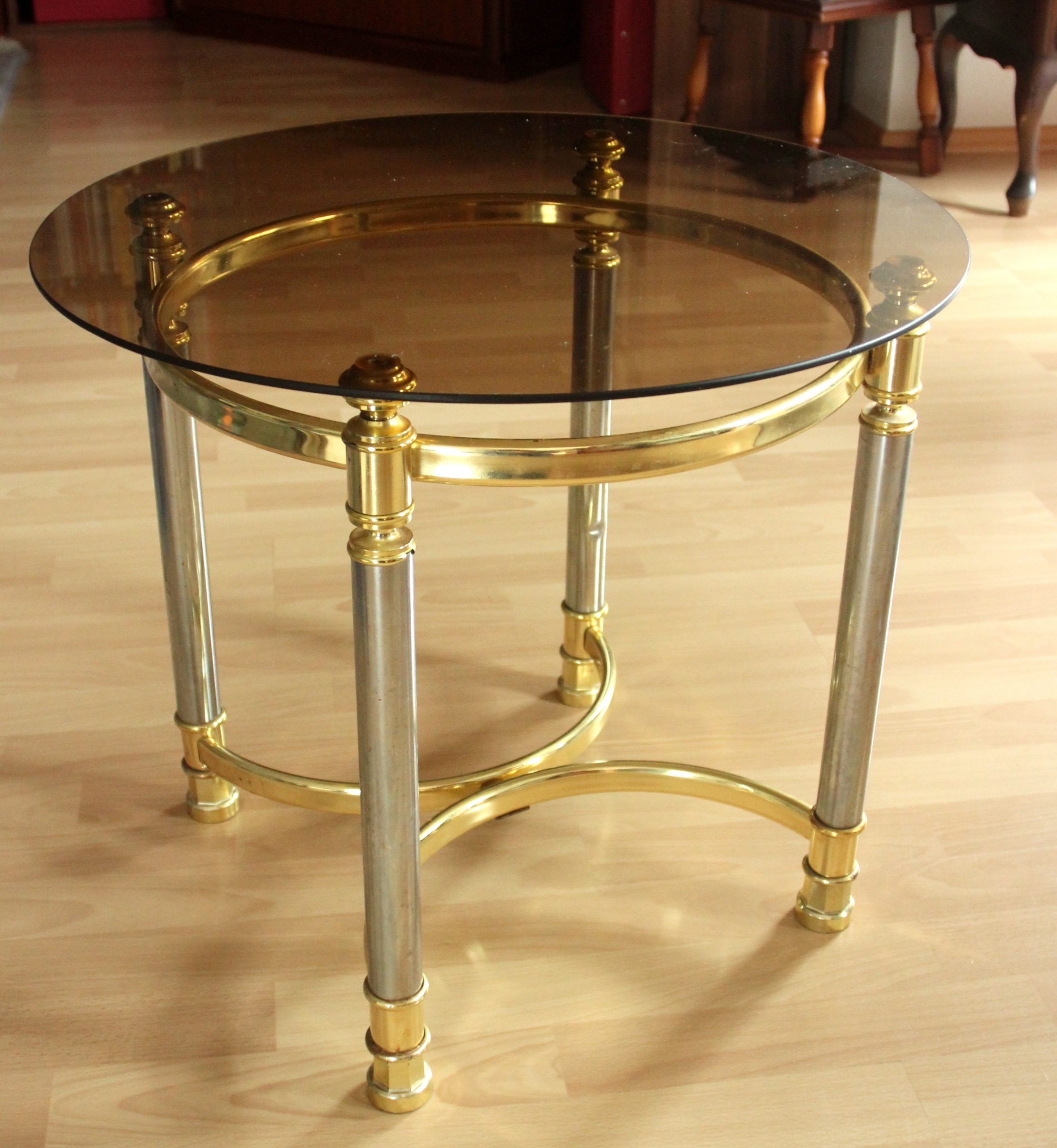 Hollywood Regency Style round coffee table, side table, made of metal with a smoked glass plate, vintage from the 1970s