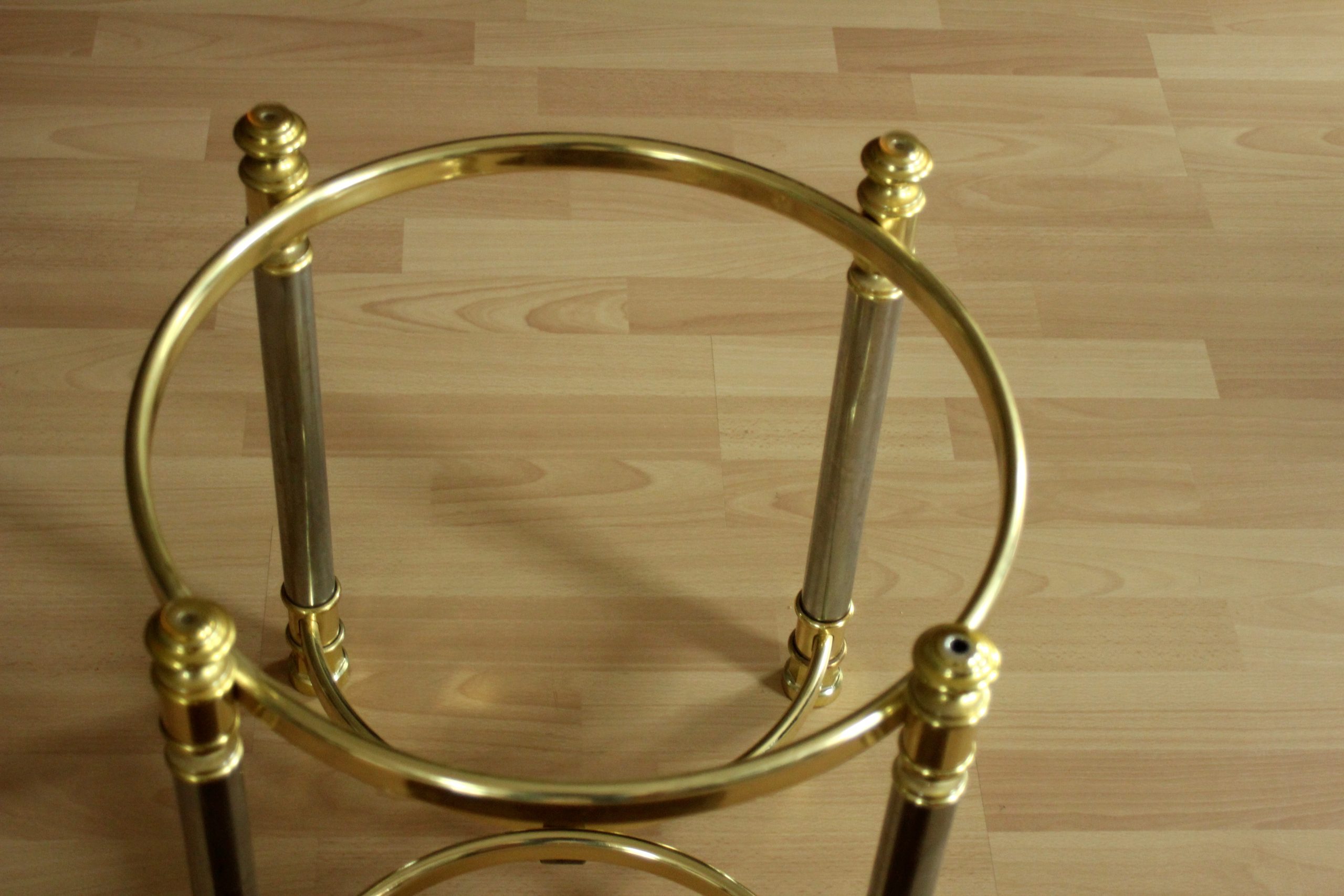 Hollywood Regency Style round coffee table, side table, made of metal with a smoked glass plate, vintage from the 1970s