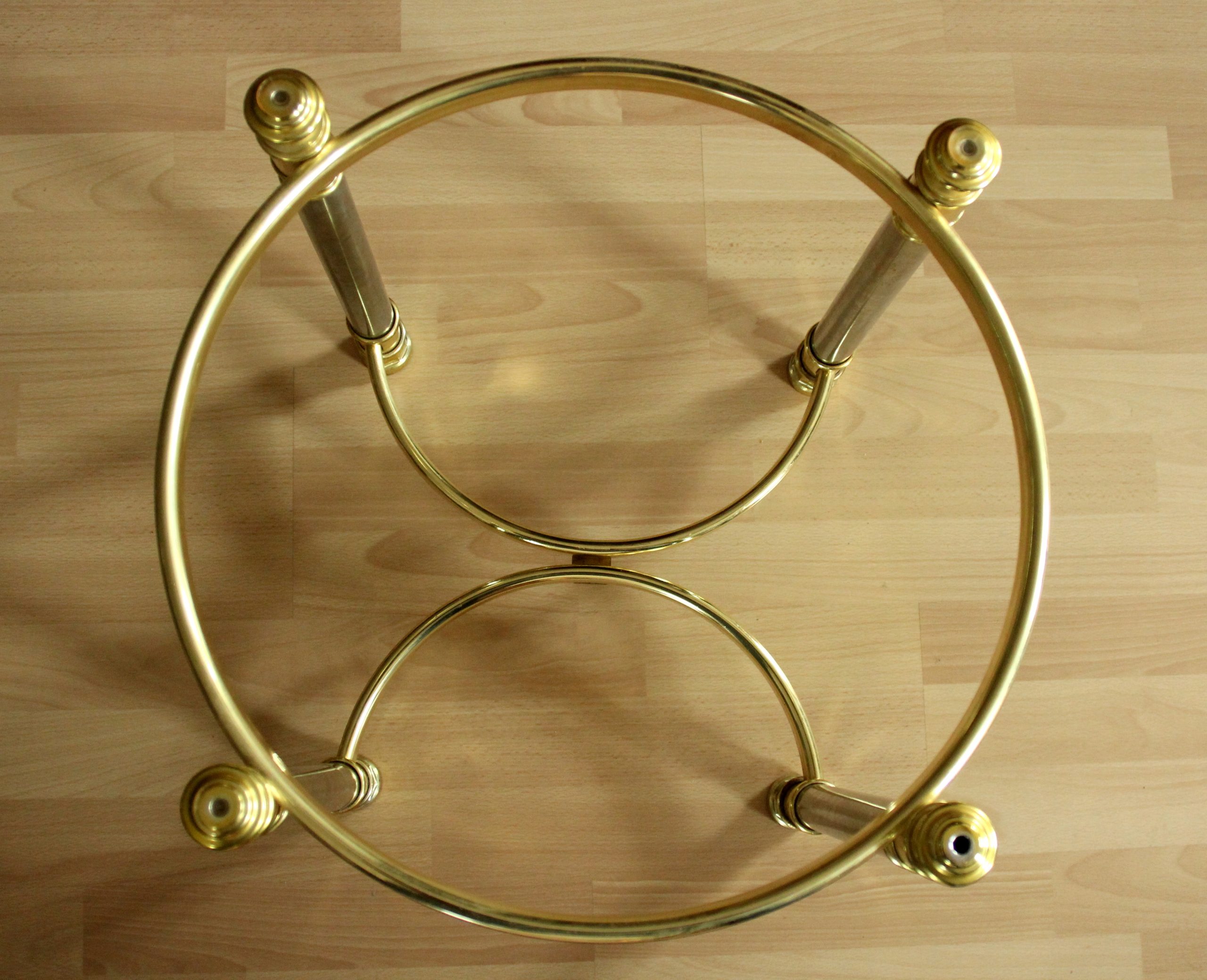 Hollywood Regency Style round coffee table, side table, made of metal with a smoked glass plate, vintage from the 1970s