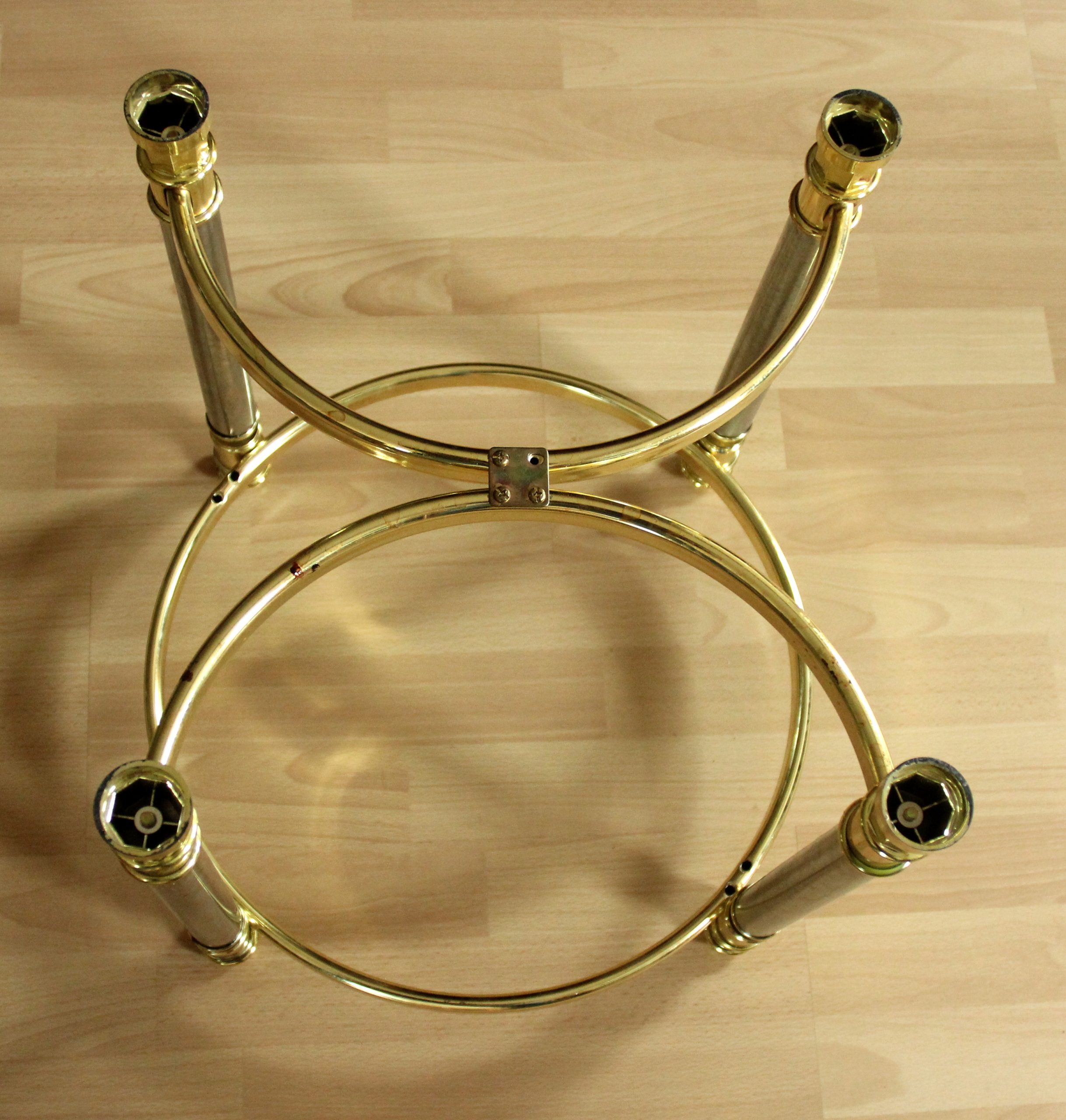 Hollywood Regency Style round coffee table, side table, made of metal with a smoked glass plate, vintage from the 1970s