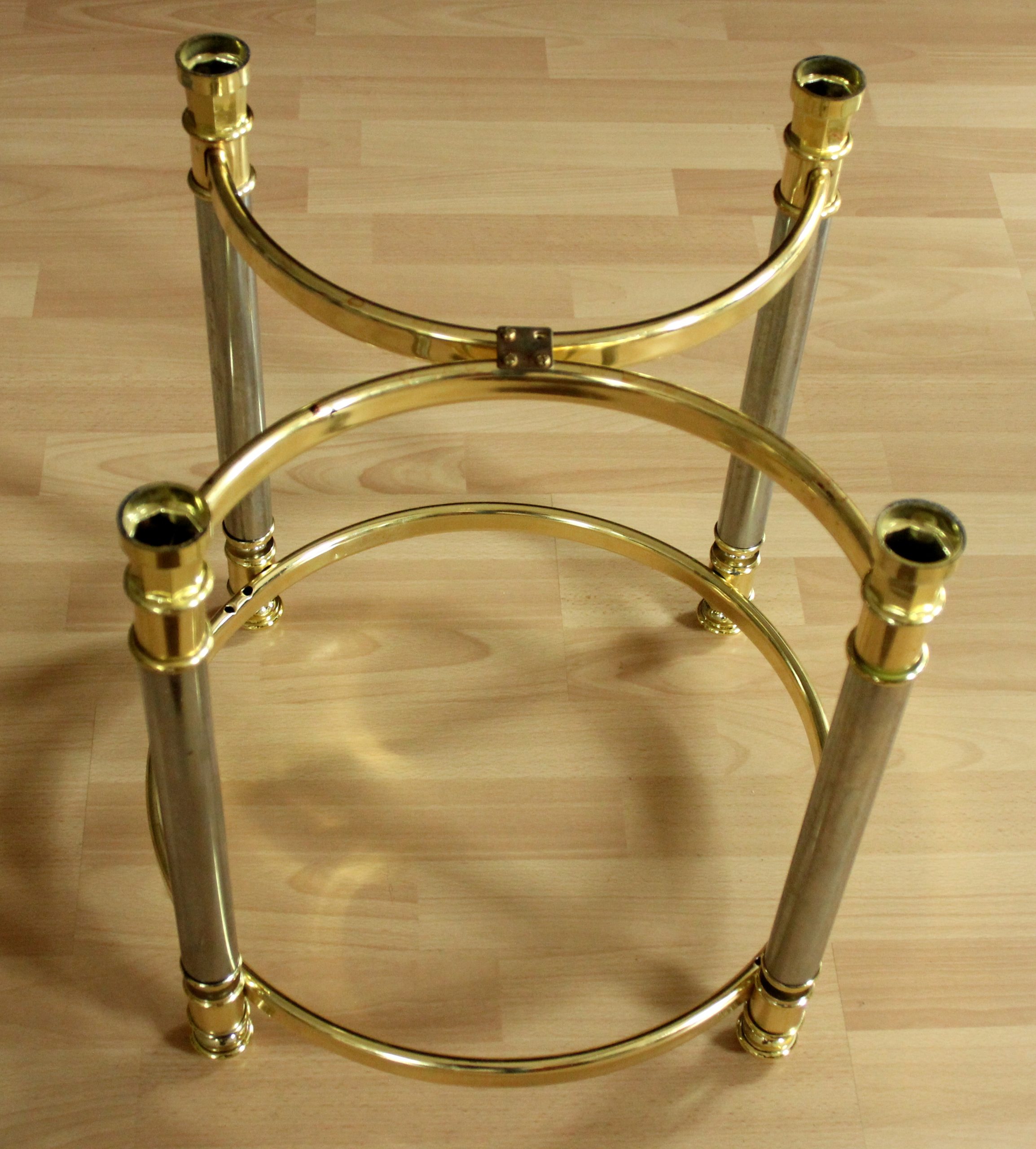 Hollywood Regency Style round coffee table, side table, made of metal with a smoked glass plate, vintage from the 1970s