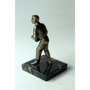 Bowler made of bronze, figurine, on a marble base, without inscription, vintage from the 60s
