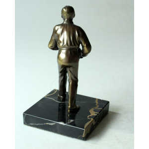 Bowler made of bronze, figurine, on a marble base, without inscription, vintage from the 60s
