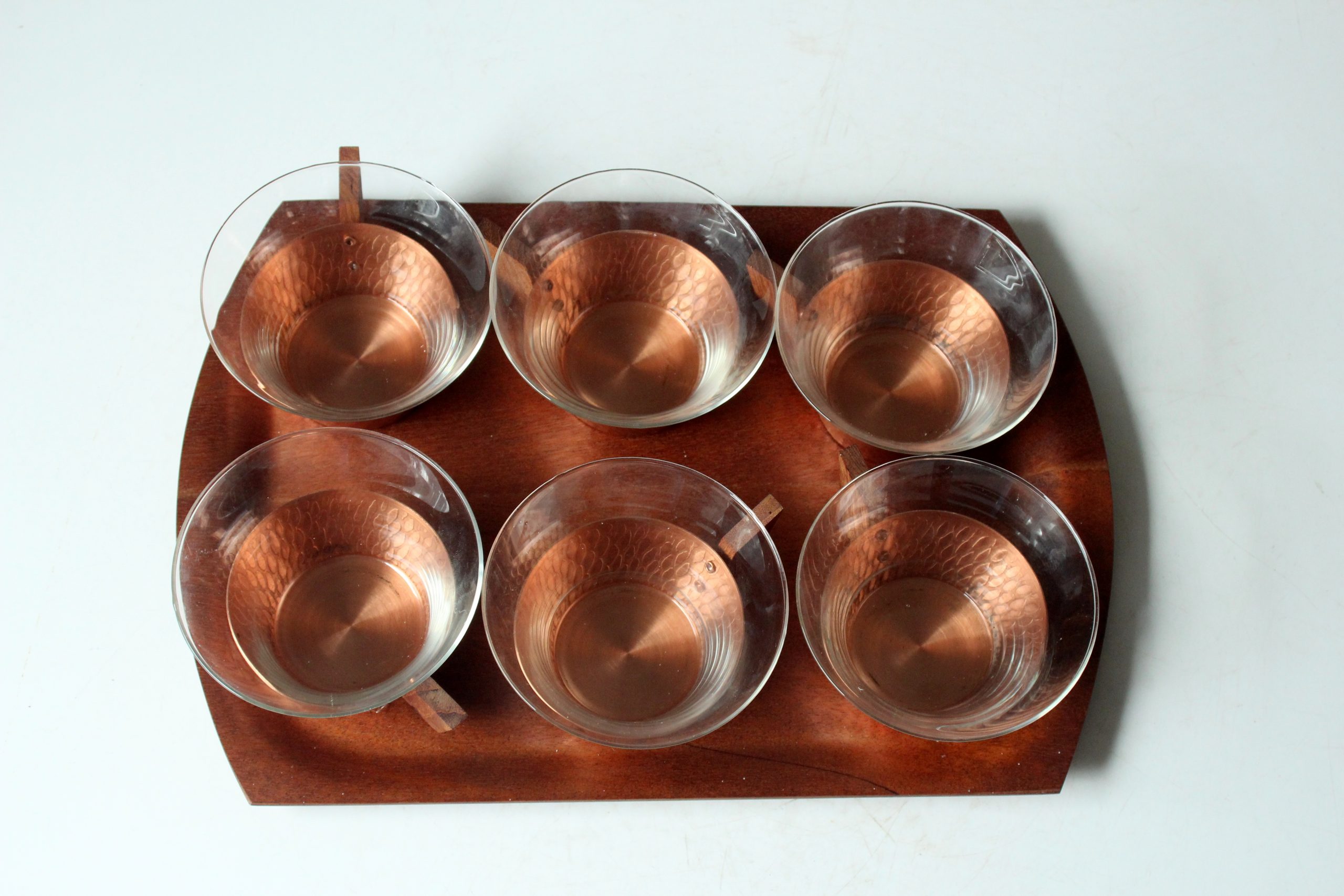 1950s - 6 glass tea cups in a copper stand with wooden handle - all on a wooden tray