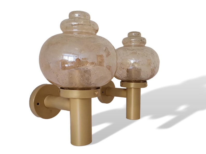 Pair large mid century wall lamp sconces in amber glass