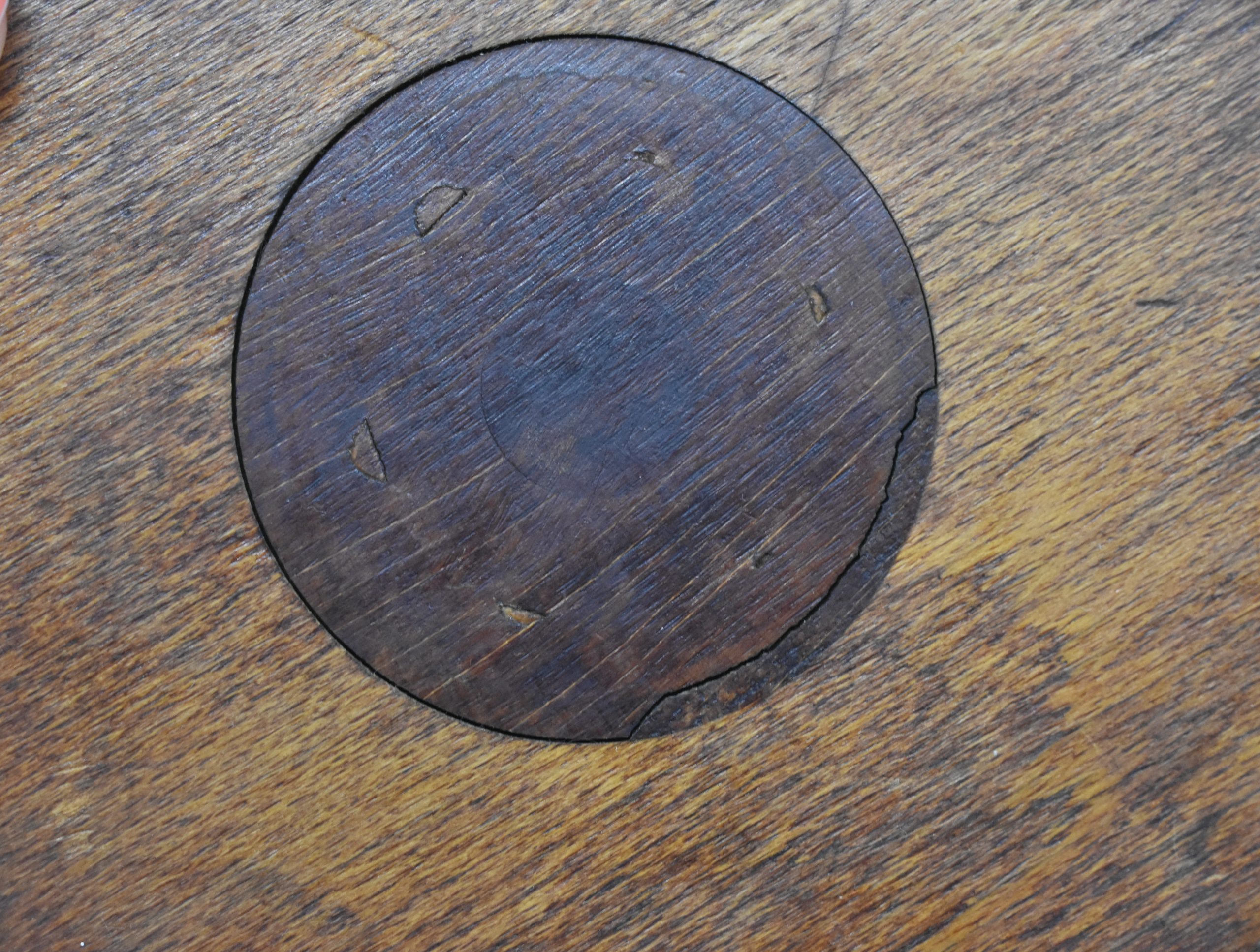 Wood and metal wine bottle coaster circa 1920, Tabletop plate, Bottle serving tray, Round footed coaster mat.