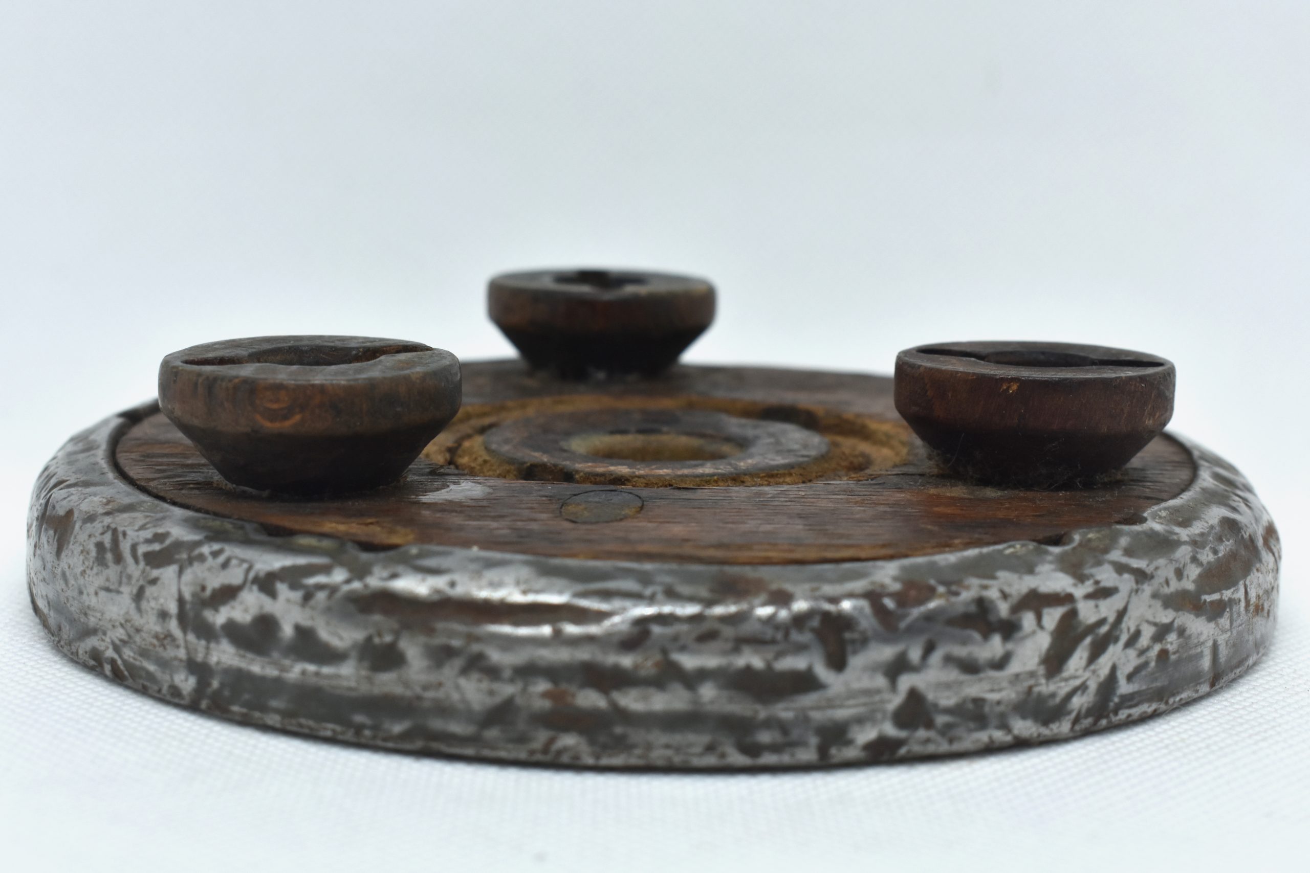 Wood and metal wine bottle coaster circa 1920, Tabletop plate, Bottle serving tray, Round footed coaster mat.