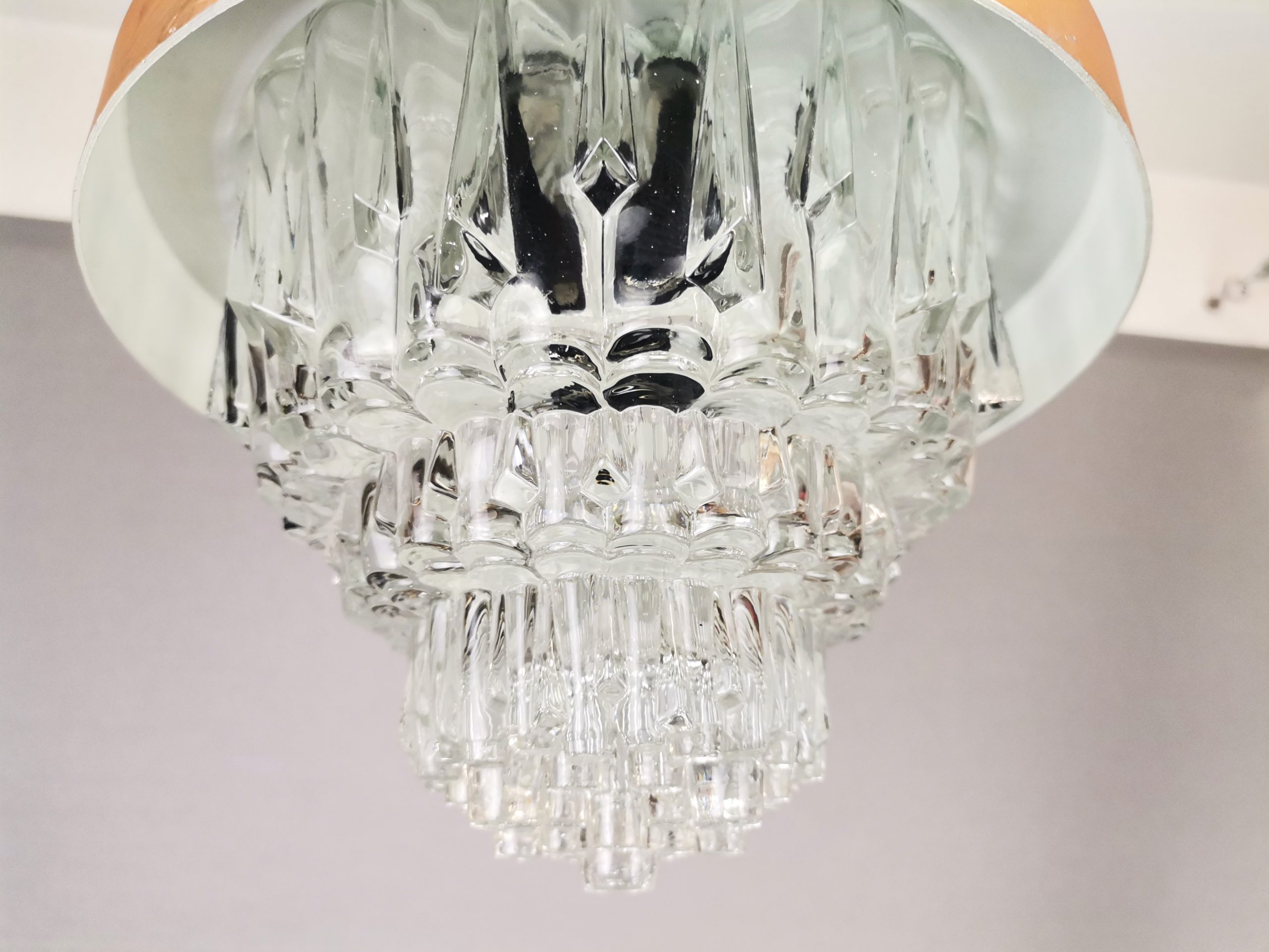 Mid Century Modern clear glass metallic copper colored aluminium hanging lamp, 1960s