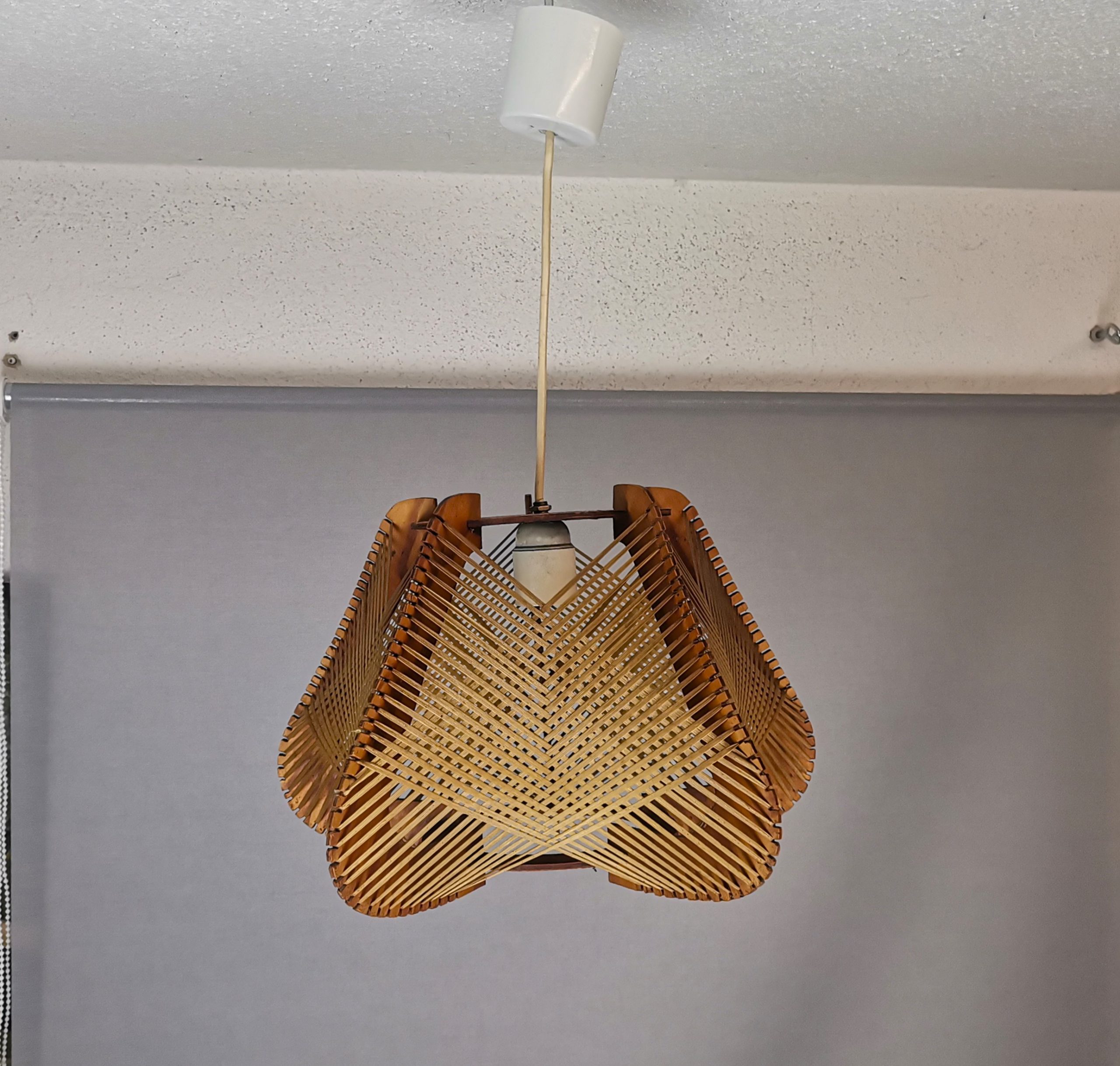 Brown plywood and straw spiderweb mid century rustic hanging lamp 1960s