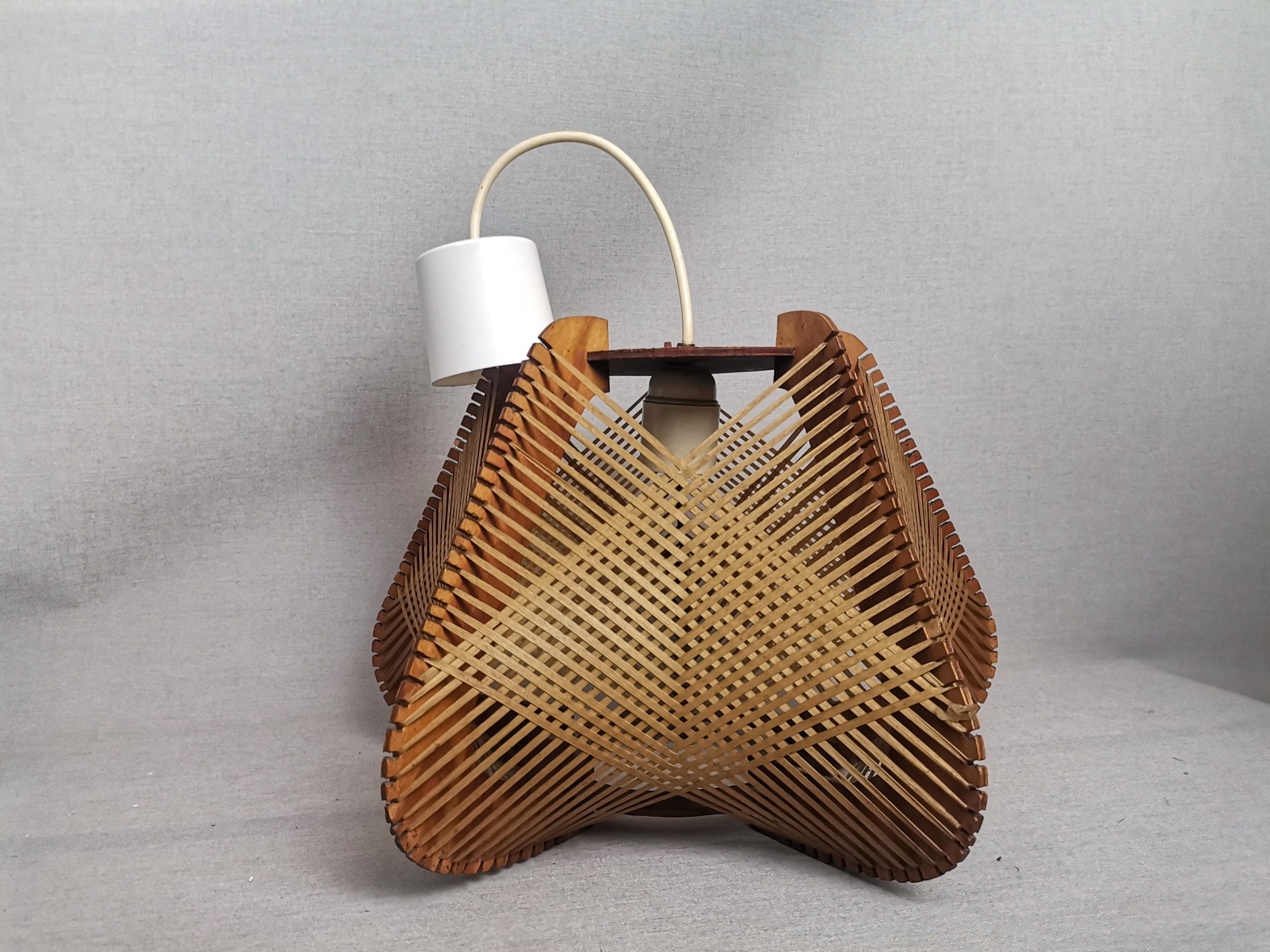 Brown plywood and straw spiderweb mid century rustic hanging lamp 1960s