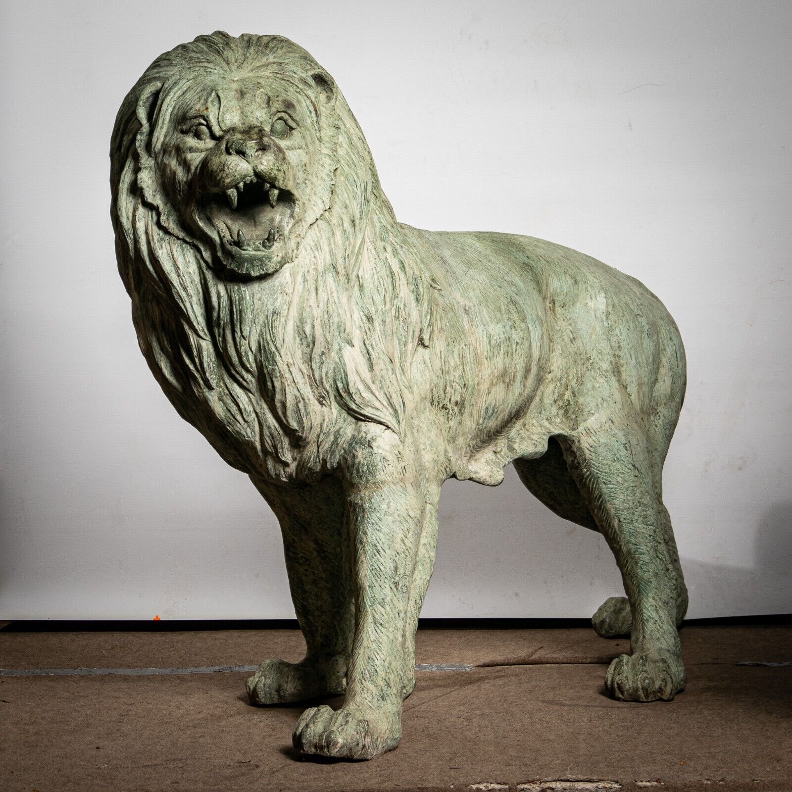 Life Size Pair of Verdigris Patinated Bronze Lions