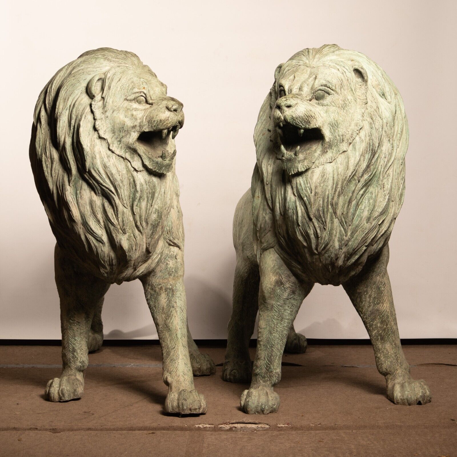 Life Size Pair of Verdigris Patinated Bronze Lions