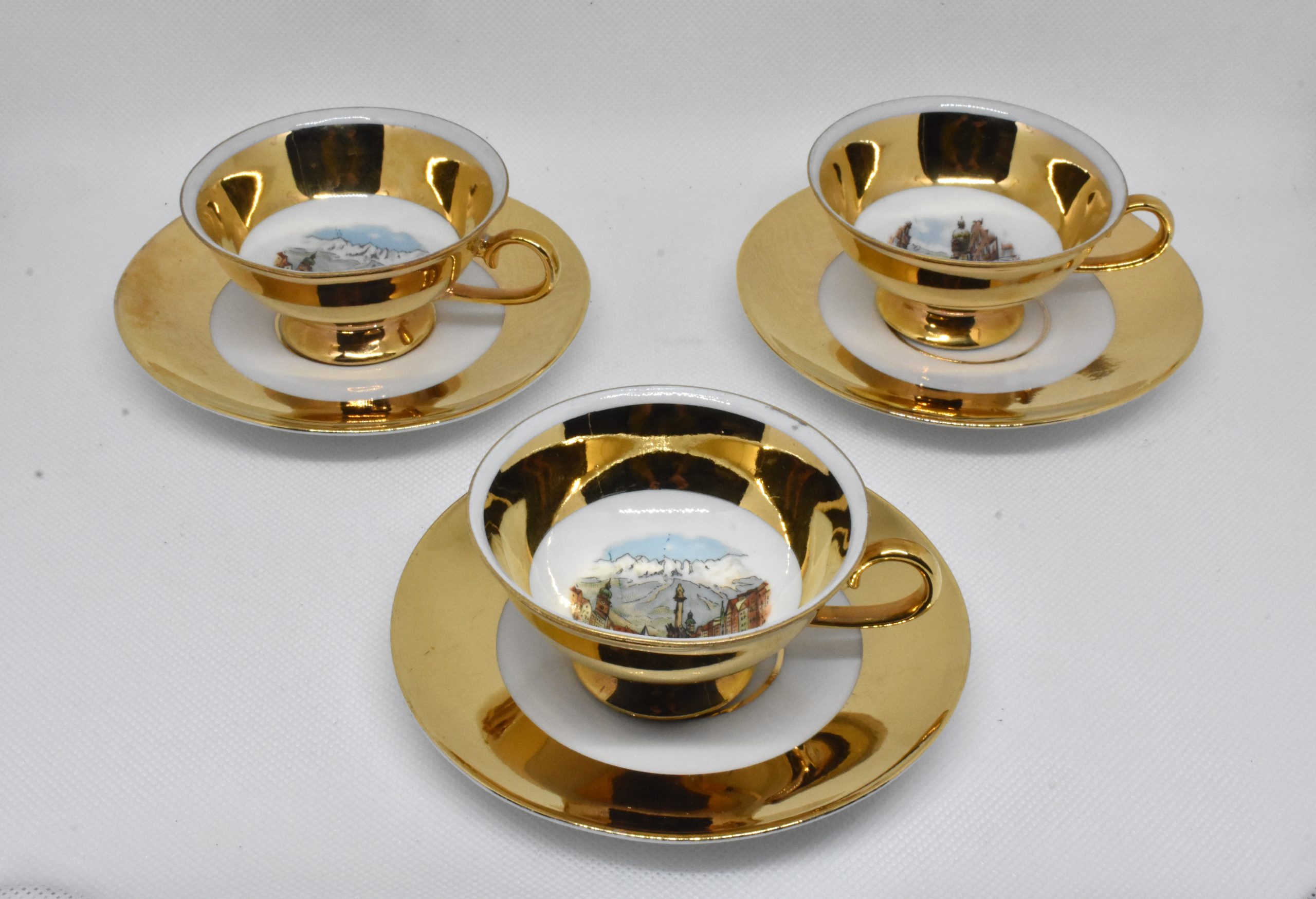 Porcelain espresso cups with saucers, vintage decorative cappuccino cups