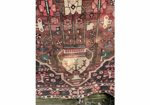 Vintage Persian rug with central medallion