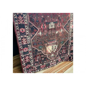 Vintage Persian rug with central medallion