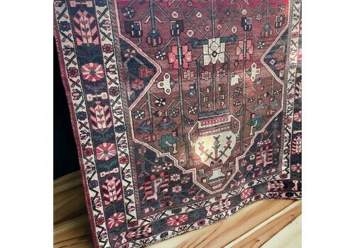 Vintage Persian rug with central medallion