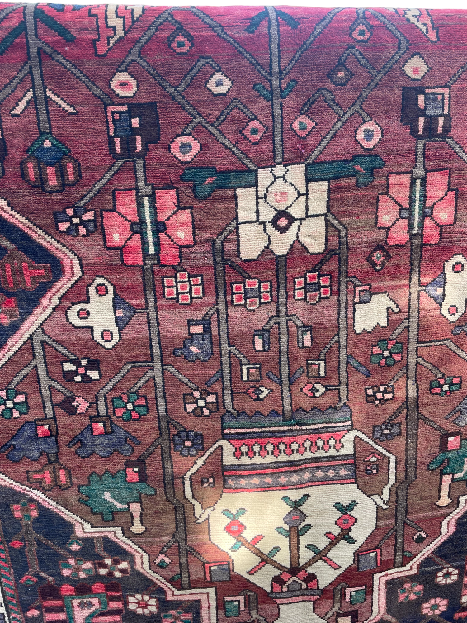 Vintage Persian rug with central medallion