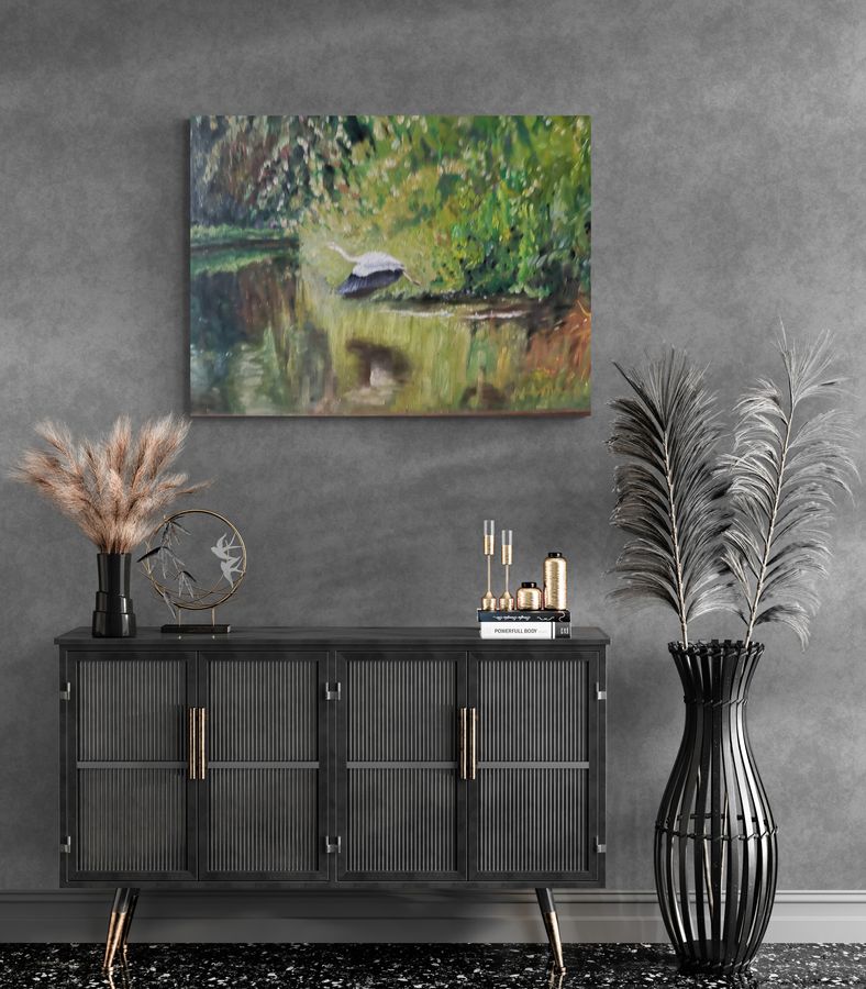 Vintage painting of a heron flying over a pond