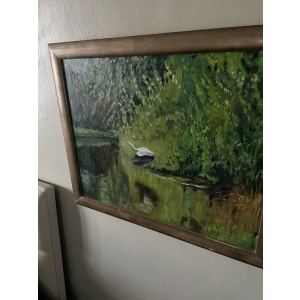 Vintage painting of a heron flying over a pond