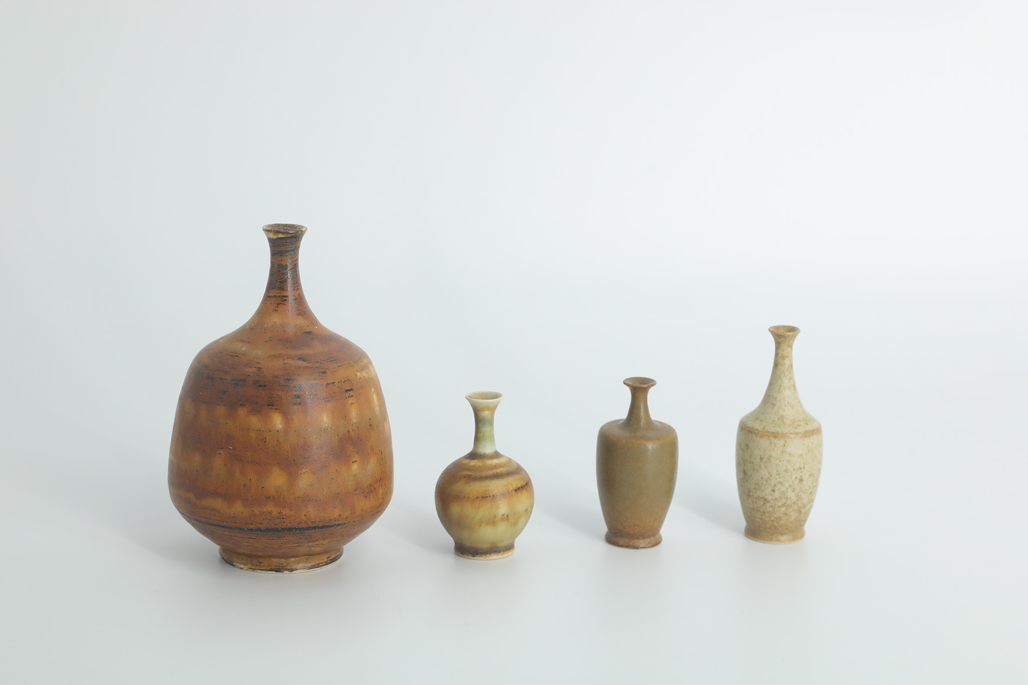 Small Mid-Century Scandinavian Modern Collectible Brown Stoneware Vases by Gunnar Borg for Höganäs Ceramics, 1960s, Set of 4
