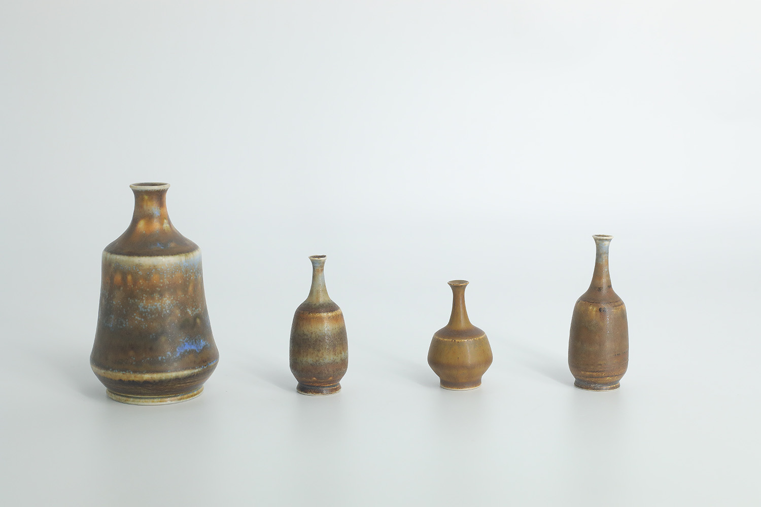 Small Mid-Century Scandinavian Modern Collectible Brown Stoneware Vases by Gunnar Borg for Höganäs Ceramics, 1960s, Set of 4