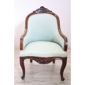 Antique upholstered walnut armchair