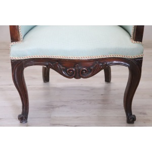 Antique upholstered walnut armchair