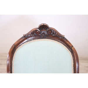 Antique upholstered walnut armchair