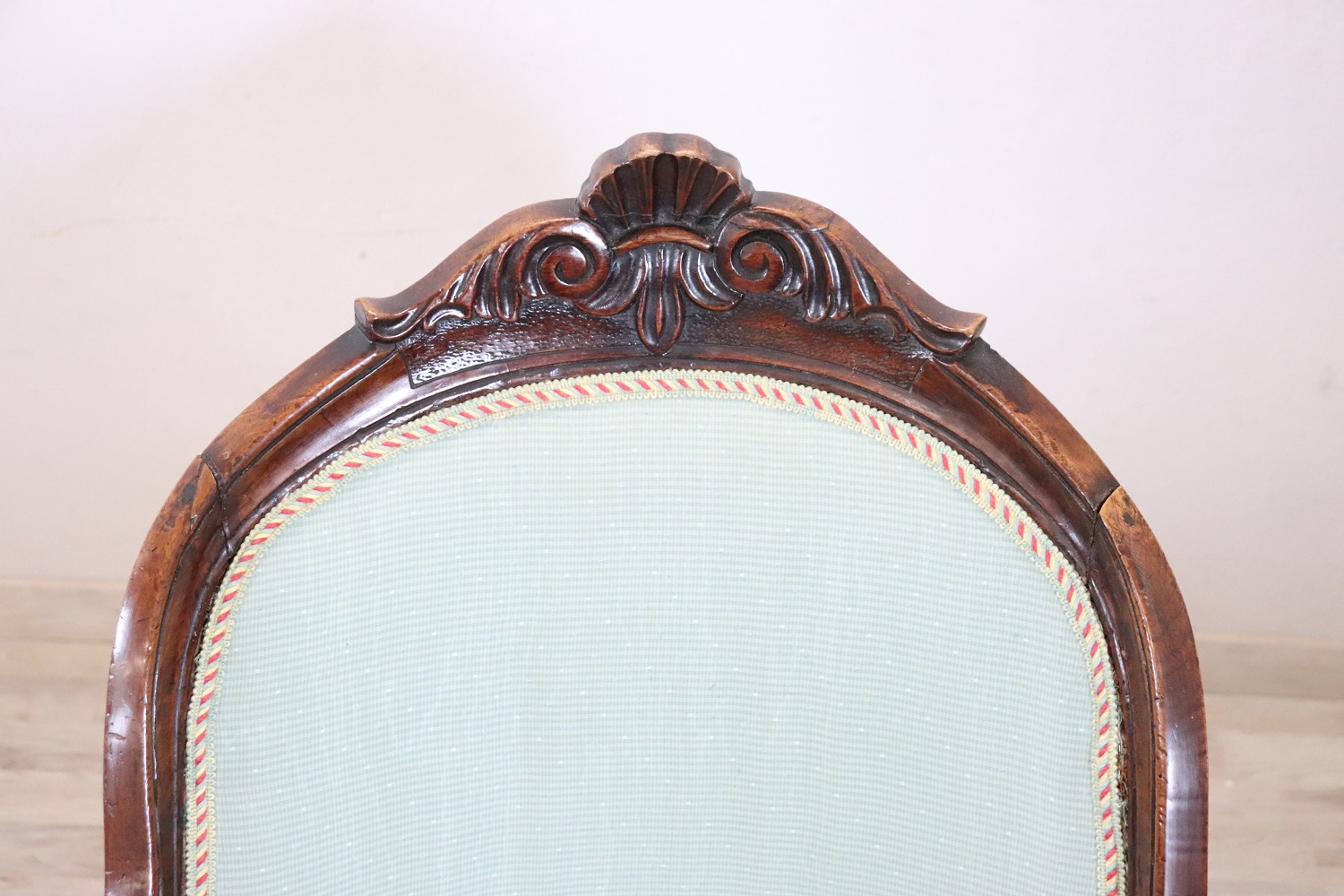 Antique upholstered walnut armchair