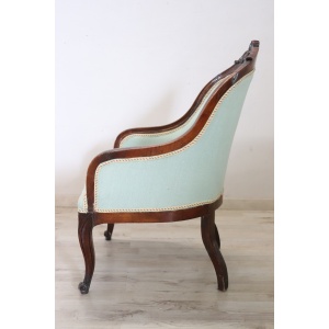 Antique upholstered walnut armchair
