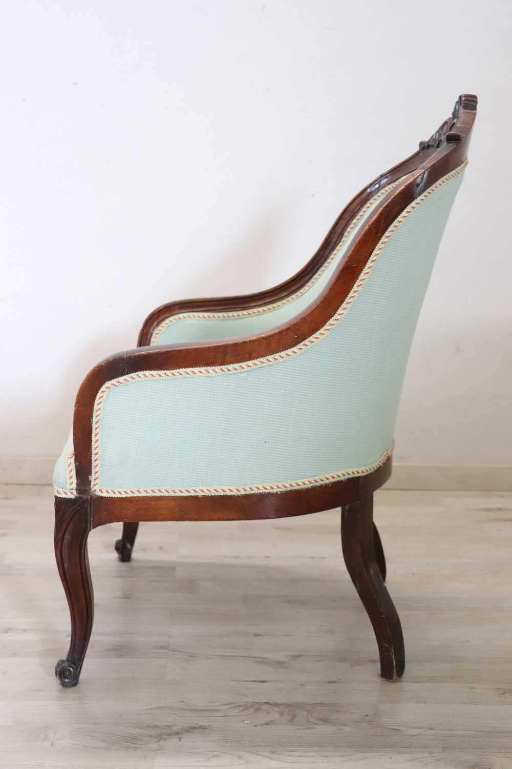 Antique upholstered walnut armchair