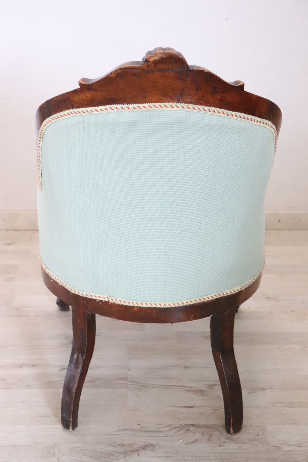 Antique upholstered walnut armchair