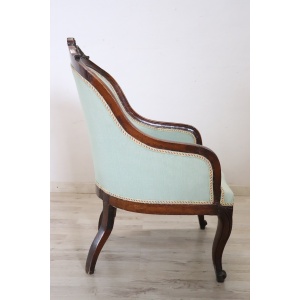 Antique upholstered walnut armchair