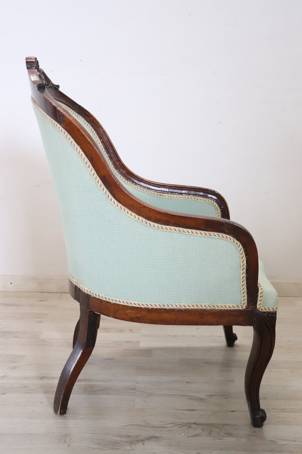 Antique upholstered walnut armchair