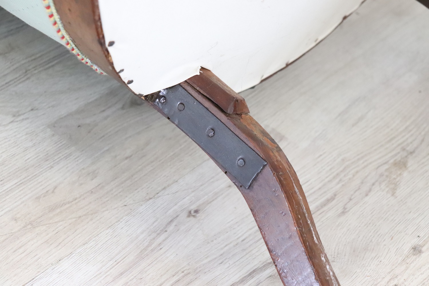 Antique upholstered walnut armchair