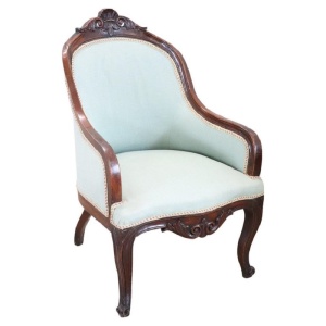 Antique upholstered walnut armchair
