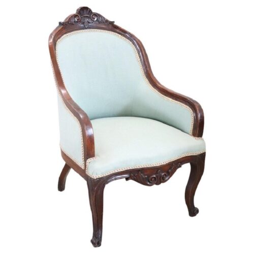 Antique upholstered walnut armchair