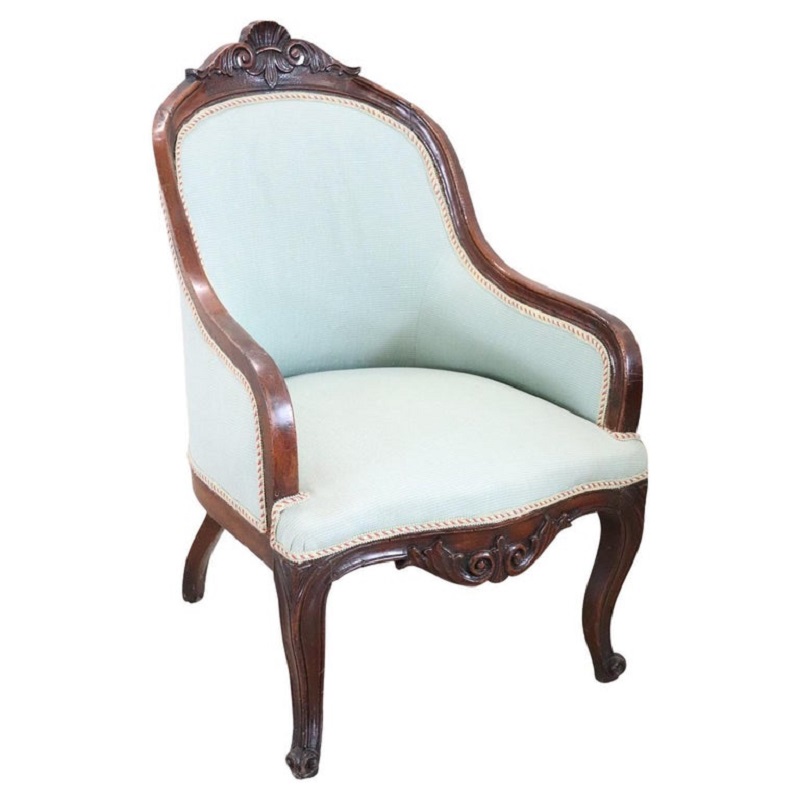 Antique upholstered walnut armchair