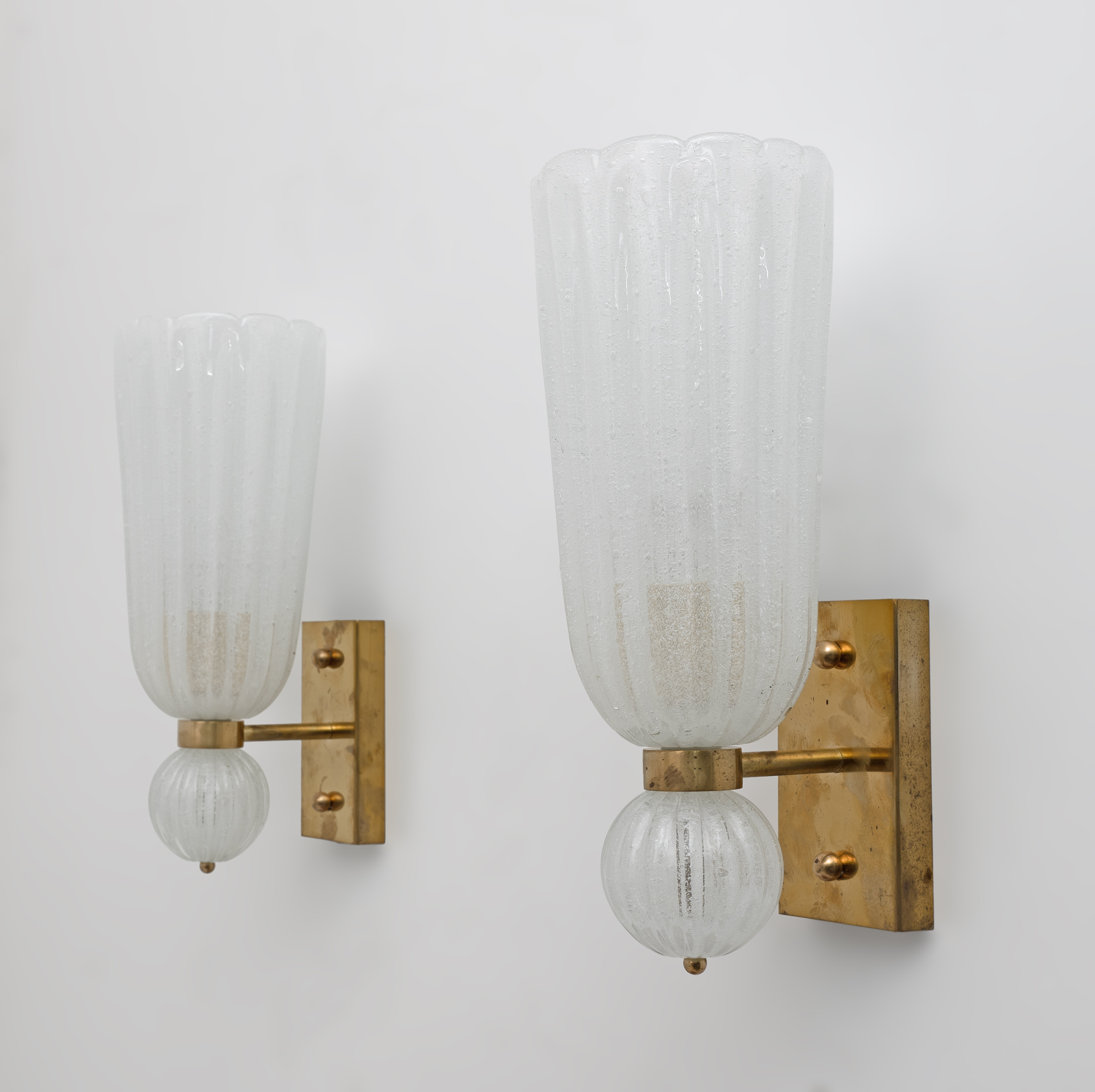 Pair of Mid-century Modern Brass and "Pulegoso" Murano Glass Sconces