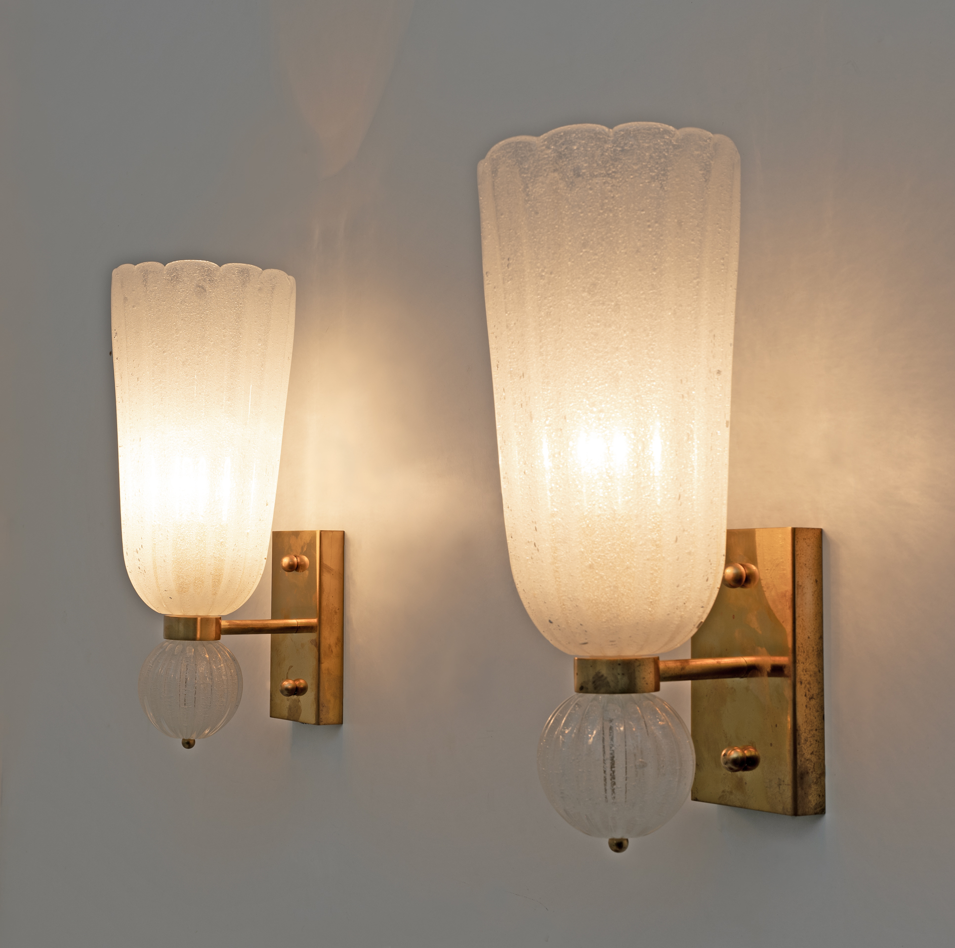Pair of Mid-century Modern Brass and "Pulegoso" Murano Glass Sconces