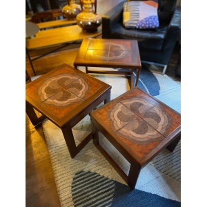 Mid century trio nesting tables with intact tile tops with teak frames and styled legs