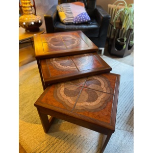 Mid century trio nesting tables with intact tile tops with teak frames and styled legs