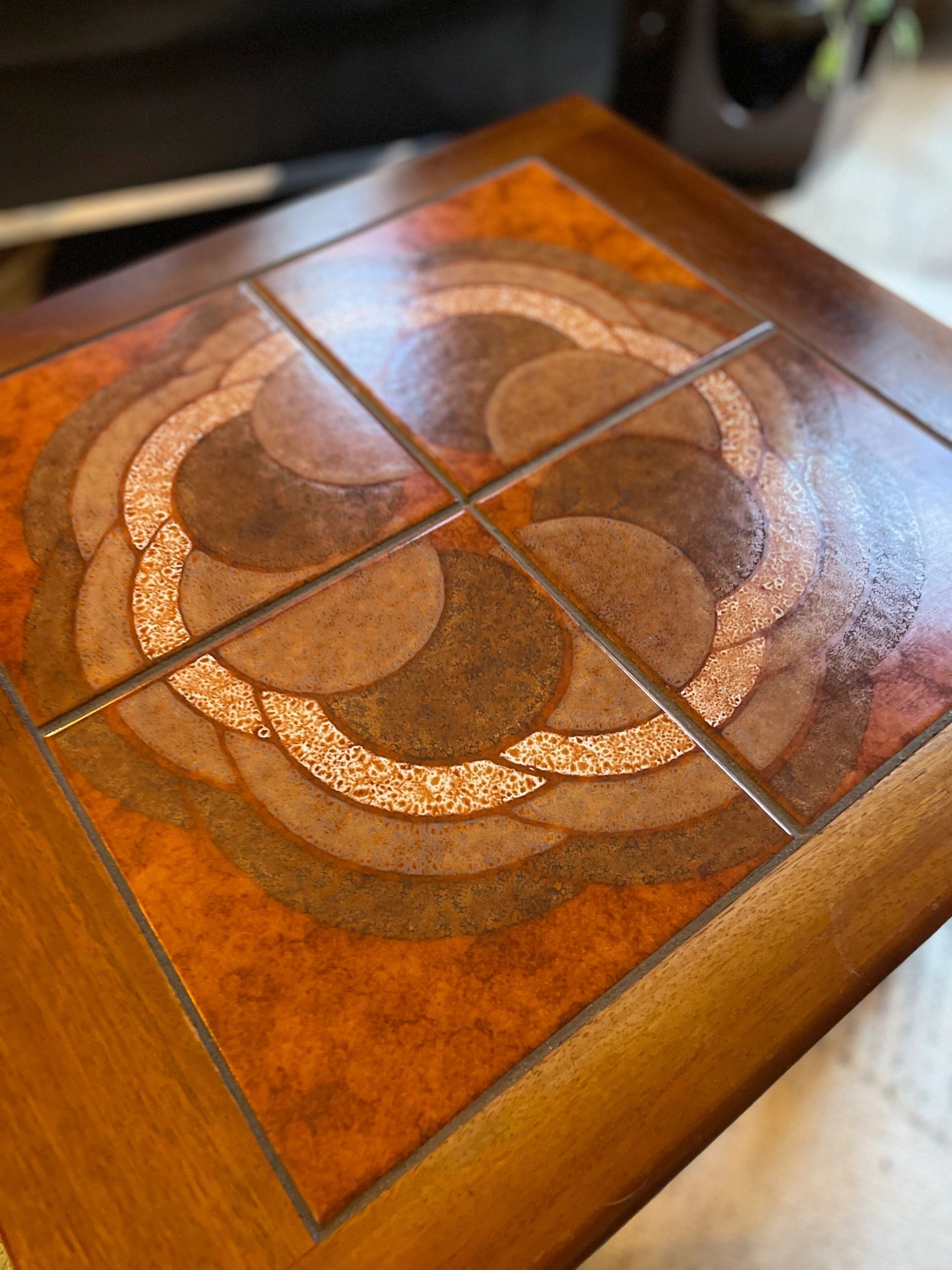Mid century trio nesting tables with intact tile tops with teak frames and styled legs